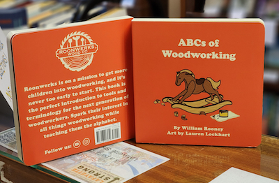 Book Cover: ABCs of Woodworking by William Rooney, with cartoon image of wooden rocking horse under construction.
