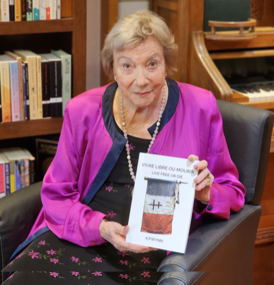 A. P. Wynn with her book Live Free or Die