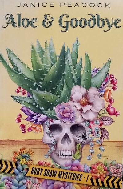 Book cover with illustration of flowering aloe plant in skull.
