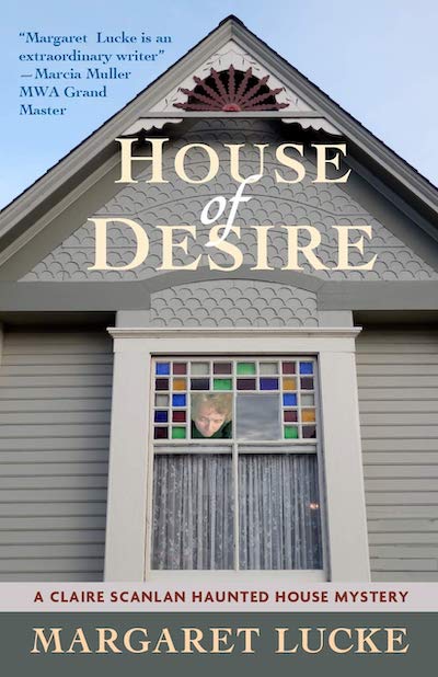 Book cover: House of Desire: A Claire Scanlan Haunted House Mystery by Margaret Lucke, showing top of Queen Anne style house with ghostly apparition in window.