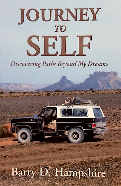 Book cover with off road vehicle in desert.