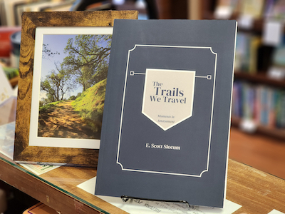 Book Cover: The Trails We Travel by Scott Slocum, with framed photograph from a trail in Northern California East San Francisco Bay.